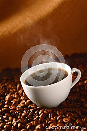 Coffee on coffee-beans 3 Stock Photo