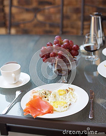 Coffee, cognac and scrambled eggs breakfast Stock Photo