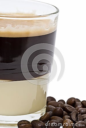 Coffee with condensed milk and coffee beans. Stock Photo