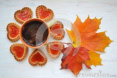 Coffee with cookies in forme of flower in hearts top view, autumn bright colors Stock Photo