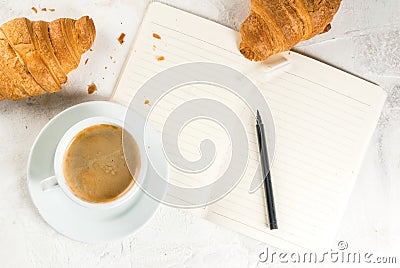 Coffee, croissants and notepad Stock Photo