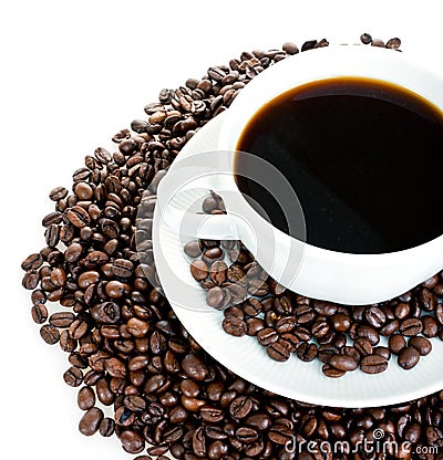 Coffee cup on beans Stock Photo