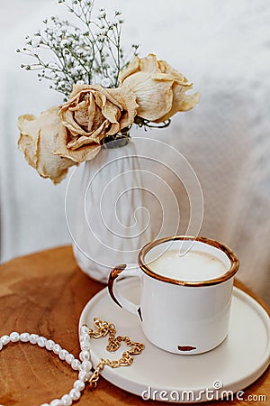 Coffee cup cappuccino, vintage dried flowers, cozy home Stock Photo