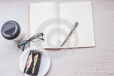 A coffee cup with charcoal sanwiches Stock Photo