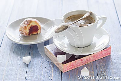 Coffee cup milk sweet dessert bitten donuts icing sugar Stock Photo