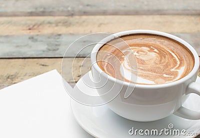 Coffee cup and notebook on grune background Stock Photo