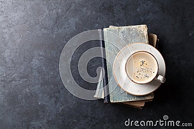 Coffee cup over books Stock Photo