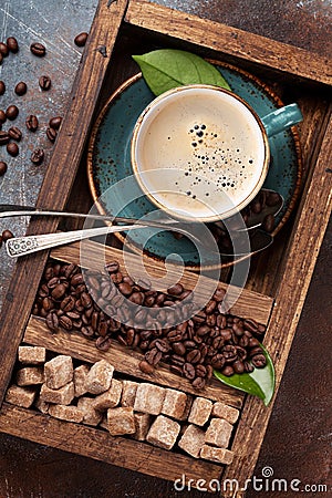 Coffee cup, roasted beans and brown sugar Stock Photo