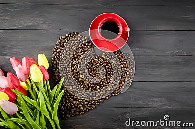 Coffee cup, coffee beans and tulips Stock Photo