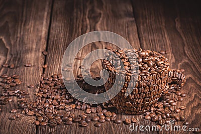 Coffee Cup Table Tree. Cup of coffee wooden table. Full cup of coffee beans wooden table. Natural coffee beans arabica. Stock Photo