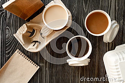 Coffee cup take away at wooden background top view Stock Photo