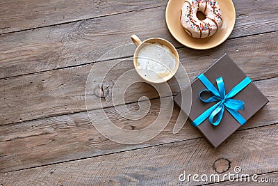 Coffee, donut and gift box Stock Photo