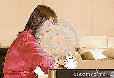 A coffee drinking woman Stock Photo