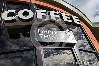 Coffee drive thru sign with reflect from glass window Stock Photo