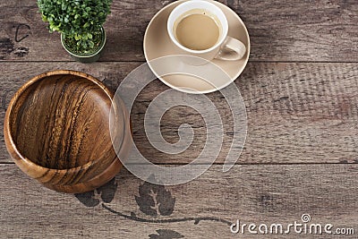 Coffee espresso, bonsai tree and bamboo bowls on a wooden table background. Dark wood. Empty place, copy space Morning in office. Stock Photo