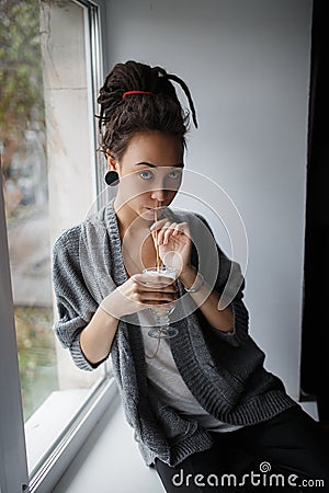 Coffee girl earing red hair eyes Stock Photo