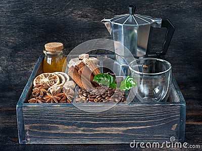 Coffee grains, honey, sugar and spices in a wooden box vintage Stock Photo