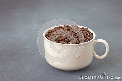 coffee grains in a white cup Stock Photo