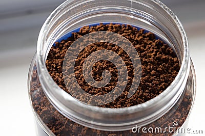 Coffee granules in jar Stock Photo