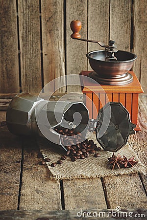 Coffee grinder, coffeepot and roasted coffee beans Stock Photo