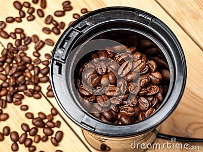 Coffee grinder for grinding roasted coffee beans, electric, close-up, selective Stock Photo