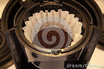 Coffee grinds in the filter Stock Photo