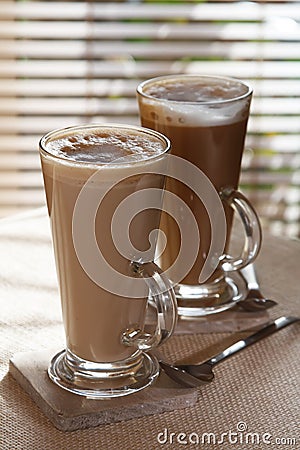 Coffee latte macchiato in tall glasses Stock Photo