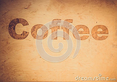 coffee lettering on wood background Stock Photo