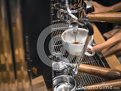 Coffee Machine Making Espresso shot Cafe Restaurant Stock Photo