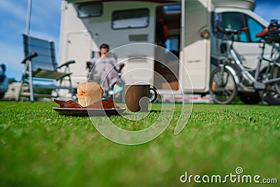 Coffee Mug on grass. Family vacation travel, holiday trip in mot Stock Photo