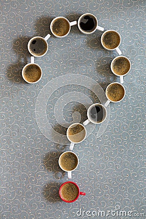 Coffee mugs arranged as a question mark Stock Photo