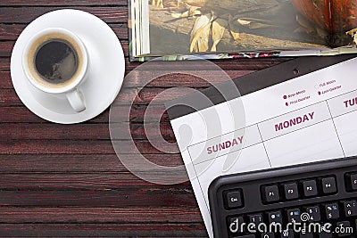 Coffee on the office calendar Stock Photo