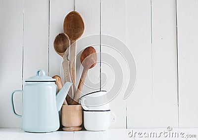 Coffee pot, enamel mugs and rustic spoons Stock Photo