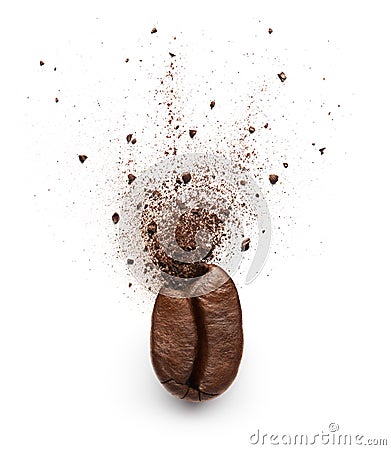 Coffee powder burst from coffee bean Stock Photo