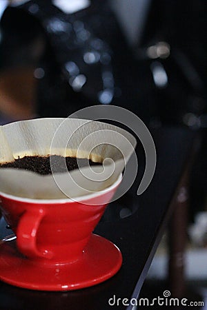 Coffee powder that will be brewed with a red cup Stock Photo