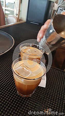 Coffee preparation making espesso in a greek bar Stock Photo