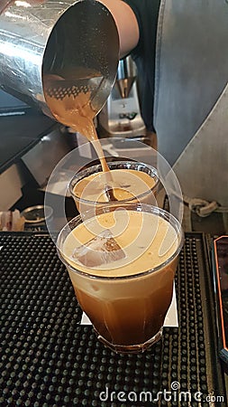 Coffee preparation making espesso in a greek bar Stock Photo