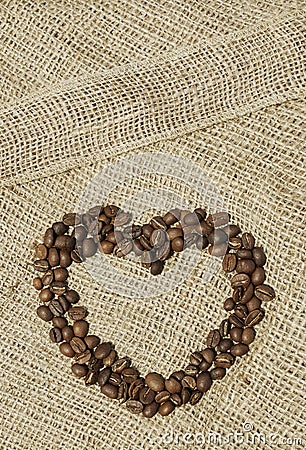 Coffee shaped heart on canvas Stock Photo