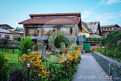 The coffee shop with flower garden in Srinagar, India Editorial Stock Photo