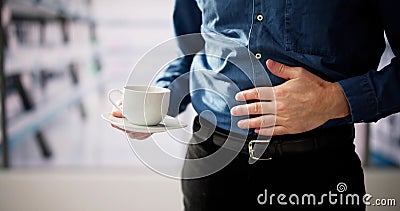 Coffee Stomach Ache. Digesting Acid Pain Stock Photo