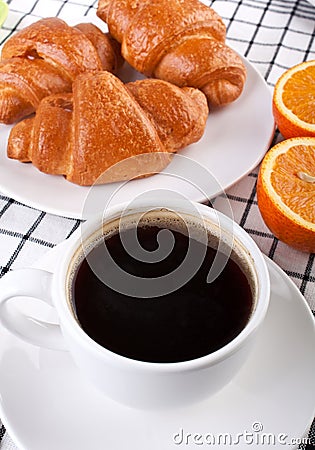 Coffee with three crescent rolls Stock Photo