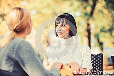 Coffee time. Meeting in cafe. fashion beauty. bisiness lunch. happy friends girls meet in cafe. female frienship. Relax Stock Photo