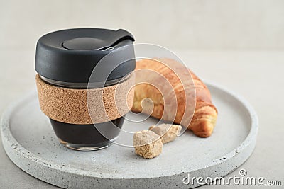 Coffee to-go in reusable travel mug Stock Photo