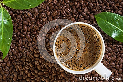 Coffee with Whole Beans and Leaves Stock Photo