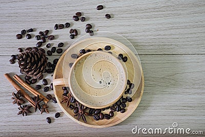 Coffee in wooden cup with milk Stock Photo