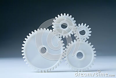 Cog wheels in white Stock Photo