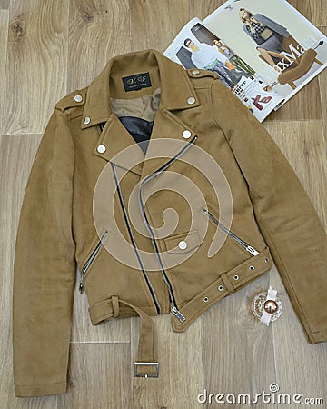 Cognac suede rocker jacket, designed by HJ Editorial Stock Photo