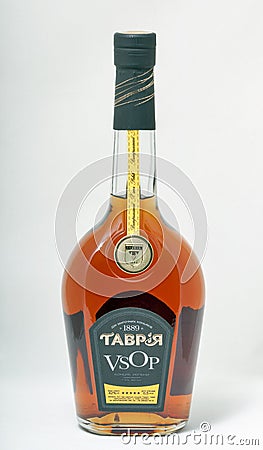 Cognac Tavria bottle closeup on white background. Editorial Stock Photo