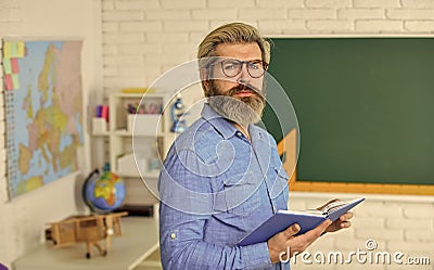 Cognitive development. Teacher work at college. Education concept. Literature and poetry. Back to school. Bearded man Stock Photo