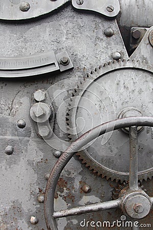 Cogwheel and crank on old machine Stock Photo